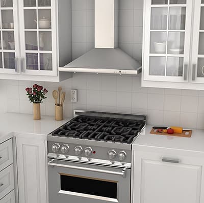 A kitchen view of the Z Line KB-36 (36") wall mount range hood for our Top 5 Wall Mount Chimney Range Hoods of 2021 listicle. The range hood is installed in a kitchen.